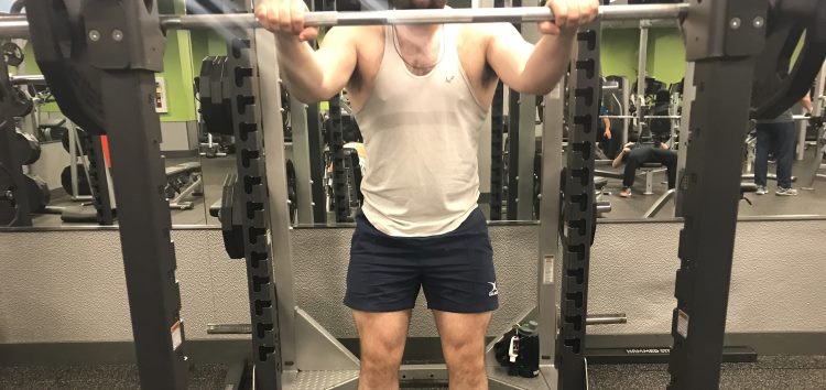 Squatting in Gilbert Rugby Shorts - Front View - Front View - Grasping Bar Before Unracking