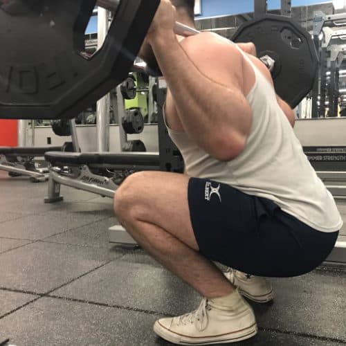 Squatting in Gilbert Rugby Shorts - Rear View - Bottom of Squat Rep