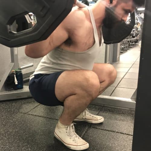 Squatting in Gilbert Rugby Shorts - Side View - Bottom of Squat Rep - 2