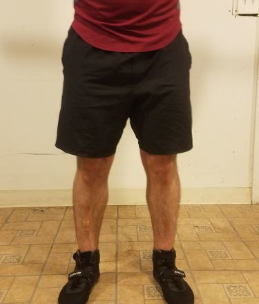 Squatting in A7 Center-stretch Shorts - Front View - Top of Squat Rep