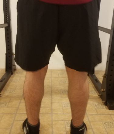 Squatting in A7 Center-stretch Shorts - Rear View - Top of Squat Rep