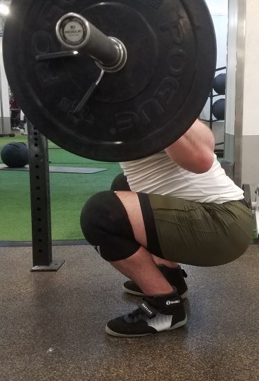 Squatting in Young LA Lifting Shorts - Side View - Bottom of Squat