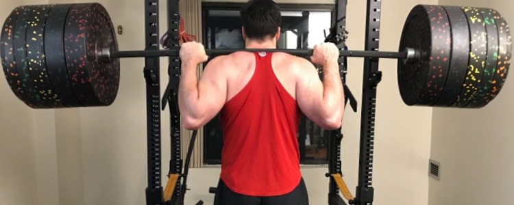 Stiff Power Bar Demonstrated As I Squat with the Vulcan Absolute Bar