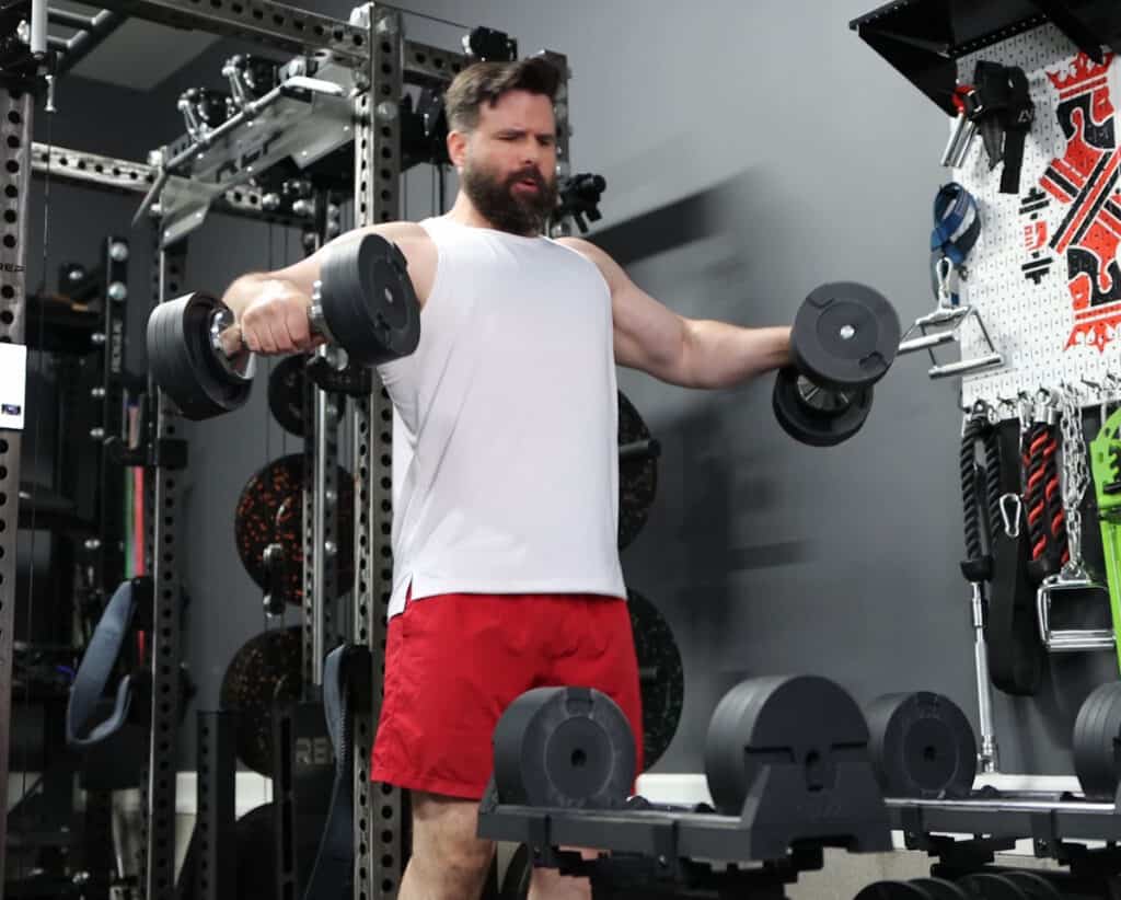 Doing Lateral Raises to Demonstrate the Issue of Large Increments on the Snode AD80 Dumbbells