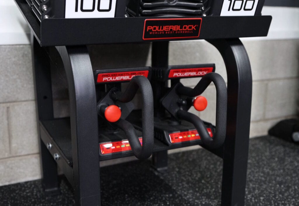 Bottom Storage Shelf on the PowerBlock Commercial Pro Rack Stand - Holding Kettlebell Handles
