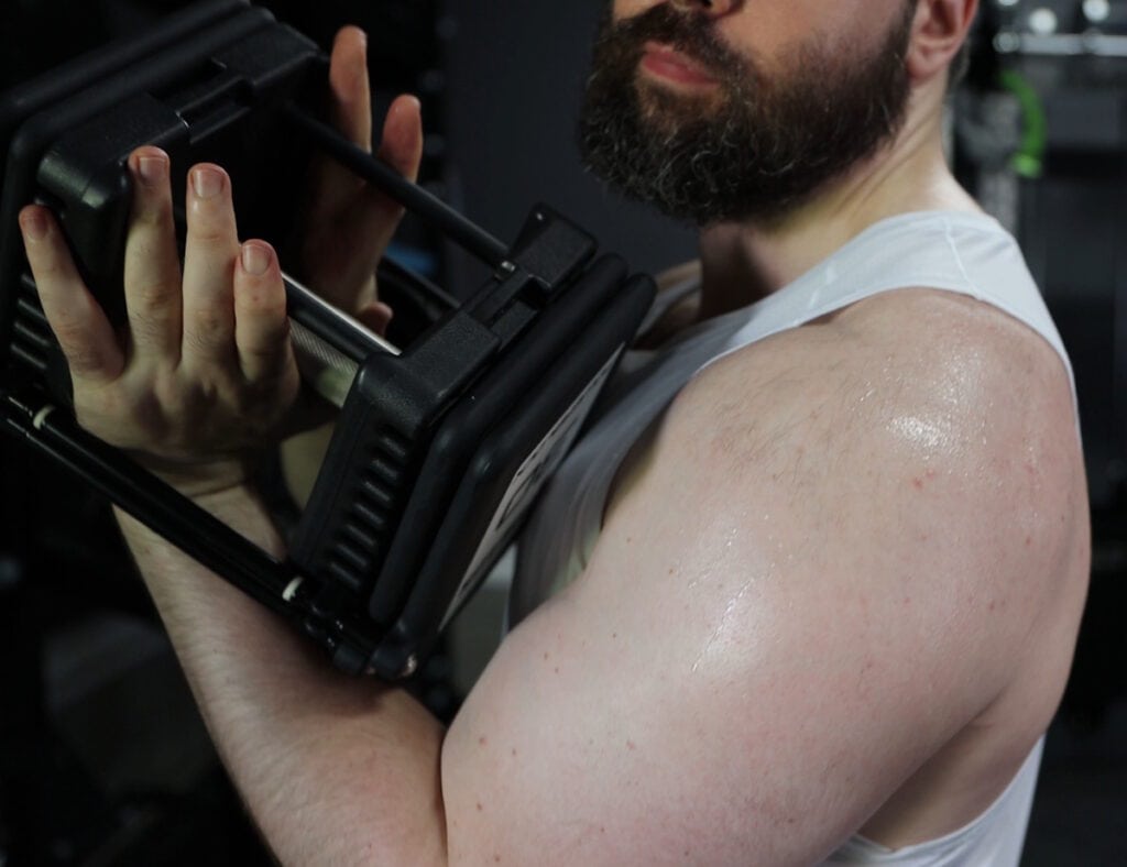 Cage Rails on PowerBlock Dumbbells Prevents Proper Hand Placement for Certain Exercises