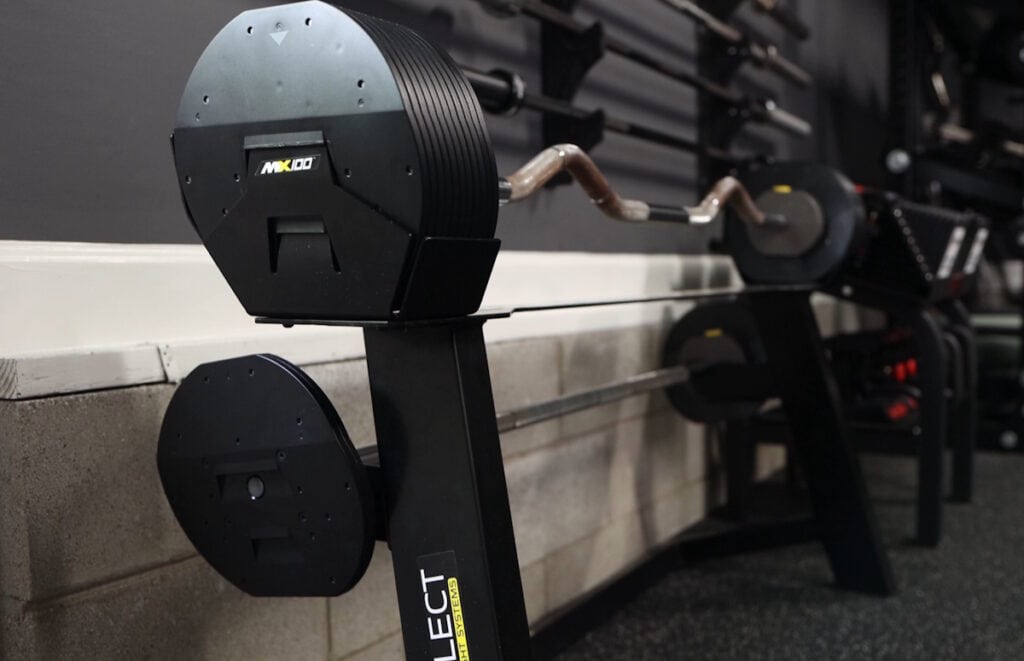 MX Select MX100 Adjustable Barbell and Curl Bar in Rack