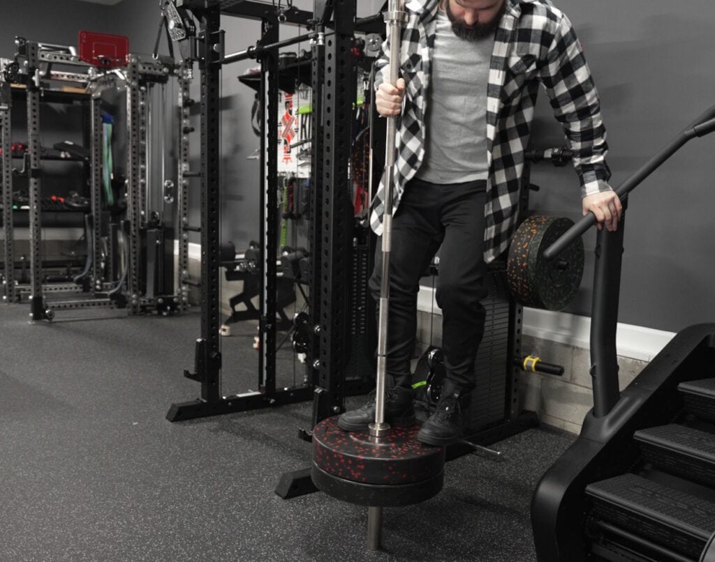 Lock-Jaw Barbell Collar Vertical Hold Test With Added Bodyweight