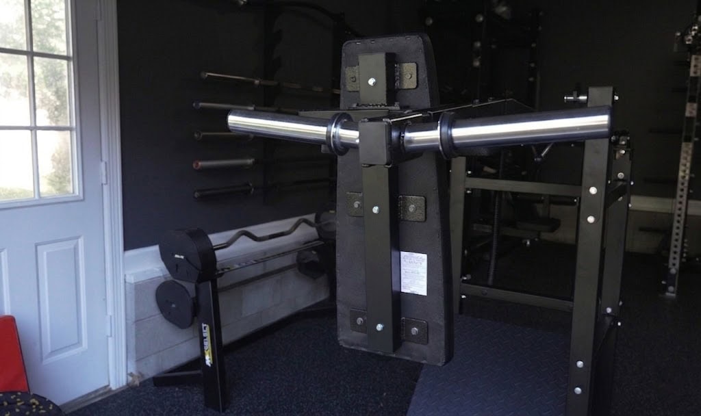 AI-rendered stability fix for GMWD Pendulum Squat Machine - Adding Welded Reinforcement Plates to the Back Pad Frame Support Piece